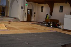 Construction project inside a church getting ready to install new pews