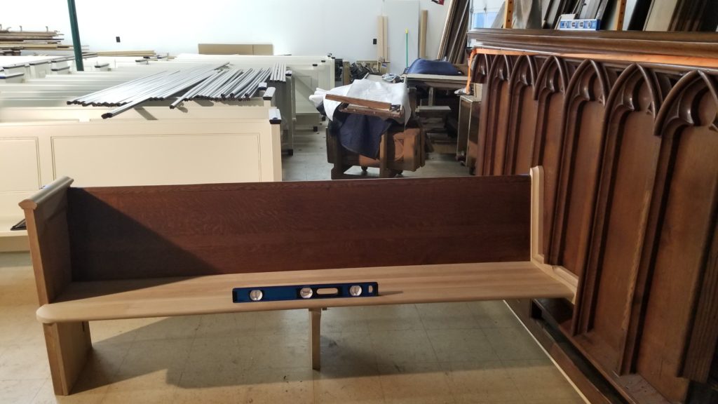 refinishing process of pews at trinity church