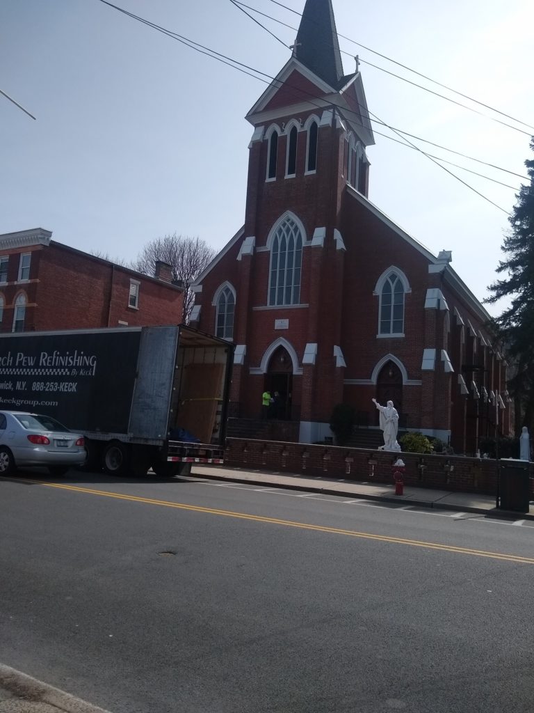 The Keck Group church pew refinishing service