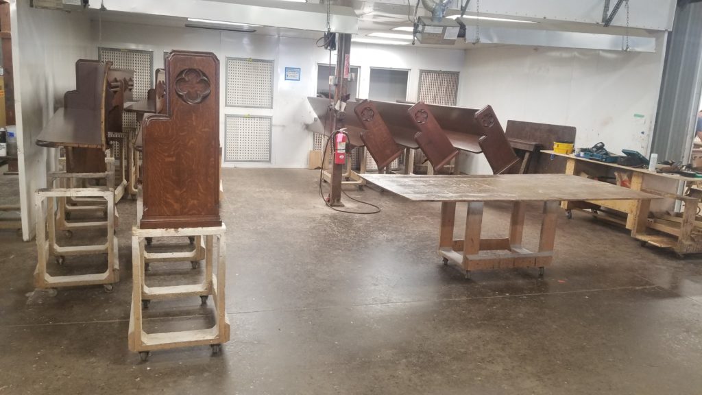 sage chapel pews being refinished 