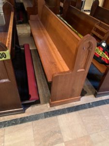 refinished wooden pews repaired for St. Rose church