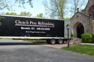 Church pew refinishing truck unloading at a church