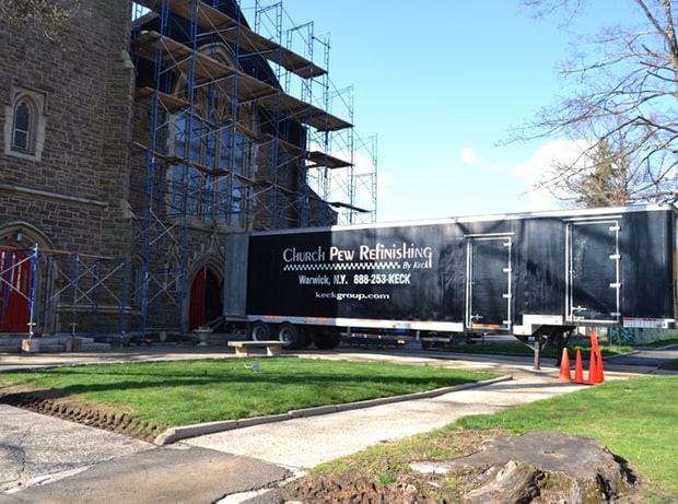 Church Pew Refinishing truck in front of Christ Church