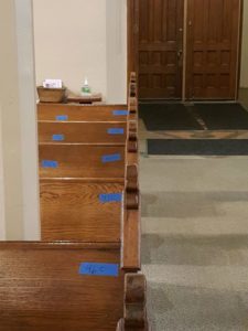 St. Joseph in Mishawaka church pew refinishing before