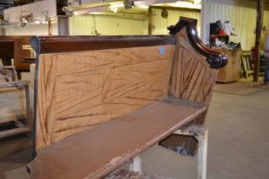 Old broken church pew before refinishing