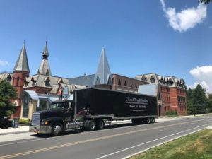 keck group pew refinishing team truck at cornell university sage chapel