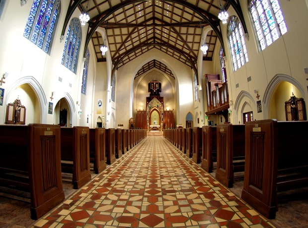 Wide angle view of the inside of St. Agnes church from the aisle
