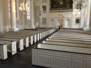 restored pews at unitarian church of all souls